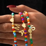 Cadeaux de panier de Pâques pour enfants filles – Collier avec initiales de perles colorées pour adolescentes, accessoires tendance, collier ras du cou avec lettres délicates, cadeaux d'anniversaire, de Pâques pour les tout-petits et les adolescents